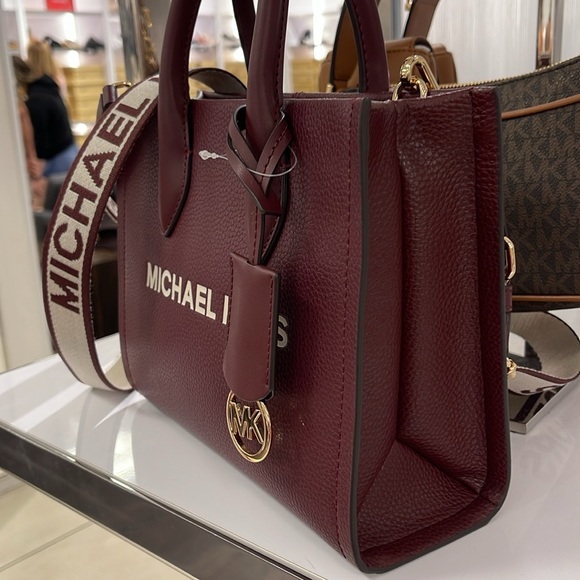 Michael Kors Mirella Small Pebbled Leather Crossbody Bag
Oxblood 
NWT - Picture 5 of 16